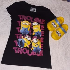 Blacktop Despicable Me characters displayed on it